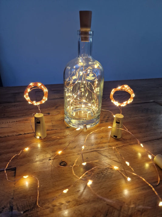 LED Wine Bottle Fairy firefly lights. Copper / Rose Gold string. Warm glow